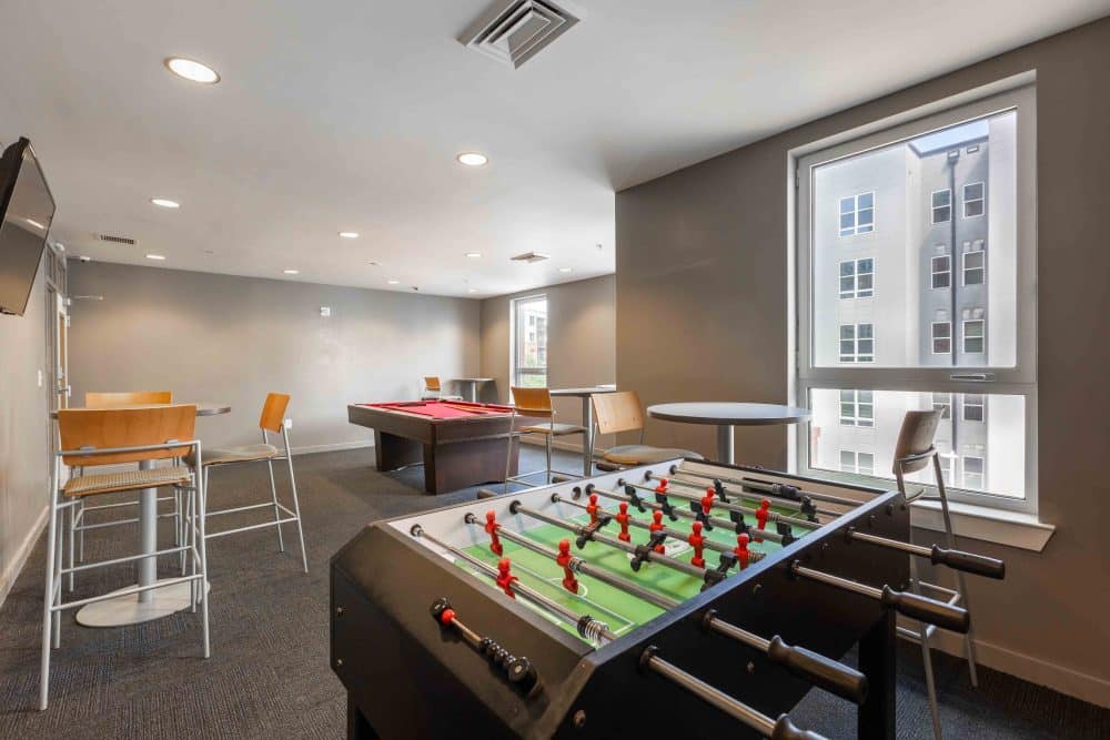 valentine commons off campus apartments just steps from nc state university game room foosball and pool tables